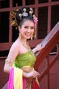 One woman in THAI RETRO DRESS is posing for a photograph.